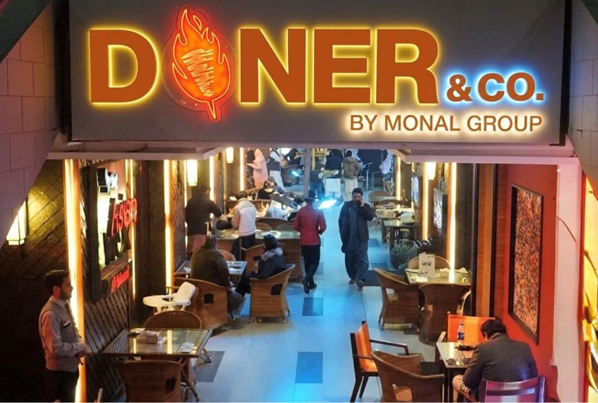 A Doner & Co. bowl of doner meat, fries and salad
